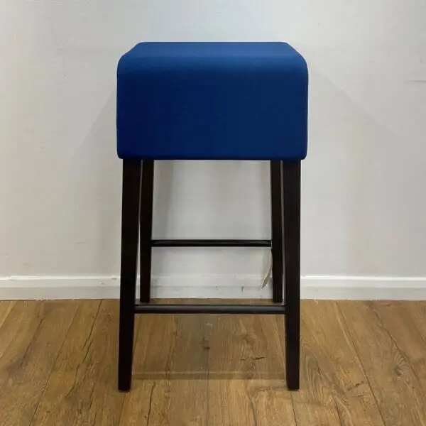 blue fabric barstool black legs and footrest