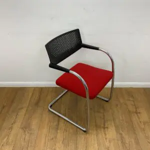 vitra red meeting chair with black mesh back and cantilever base
