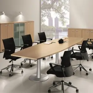 barrel shaped boardroom table with chrome trumpet base
