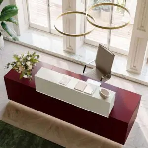 red asymmetrical reception desk